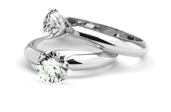 Two diamond ring on white background